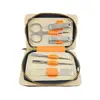 Trusă manichiură 6 piese din inox în etui portocaliu cu fermoar