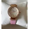 Ceas damă cu curea roz din piele și cadran decorat cu cristale