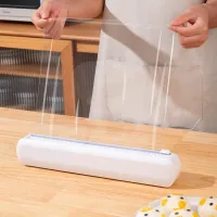 Dispenser multifuncțional pentru folie alimentară cu sistem de tăiere integrat