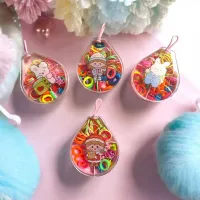 Set 12 cutiuțe lacrimă cu elasticuțe colorate pentru copii - accesorii de păr prezentate într-un ambalaj adorabil și practic