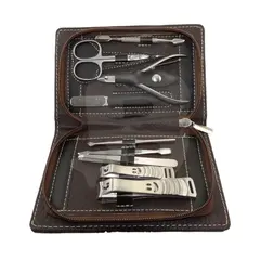 Trusă manichiură 783D cu 9 piese din inox în husă maro cu fermoar