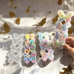 Set elasticuțe și clame colorate în cutie fluture - organizator adorabil pentru copii